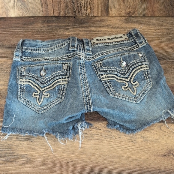 Rock Revival Pants - Rock Revival Blue Distressed Cut Off Donna Boot Jean Shorts 25